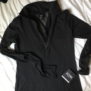 Black half-zip jacket with mesh strip in back